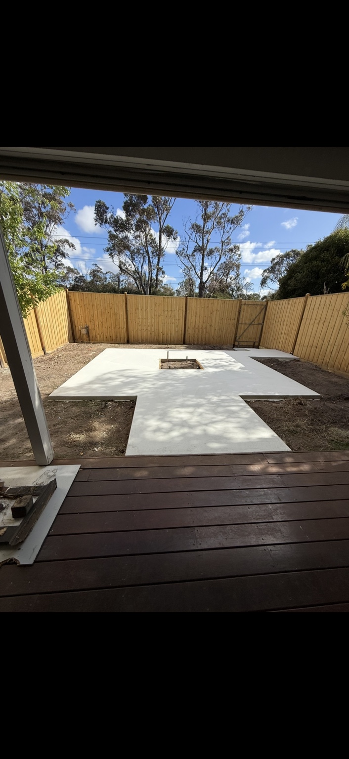 Completed fencing and concrete outdoor project
